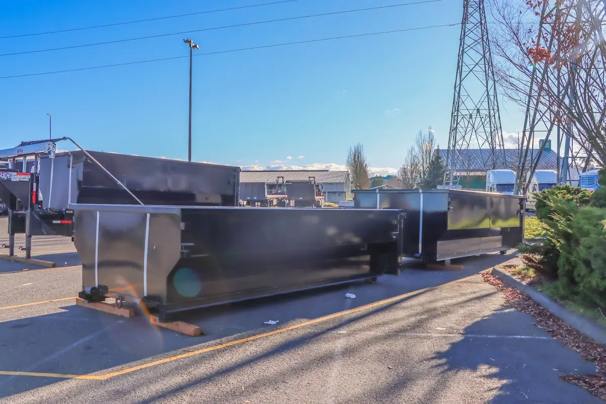 Roll-off dumpster ready for waste disposal at job site for 2 Yard Dumpster Rental in Romeoville